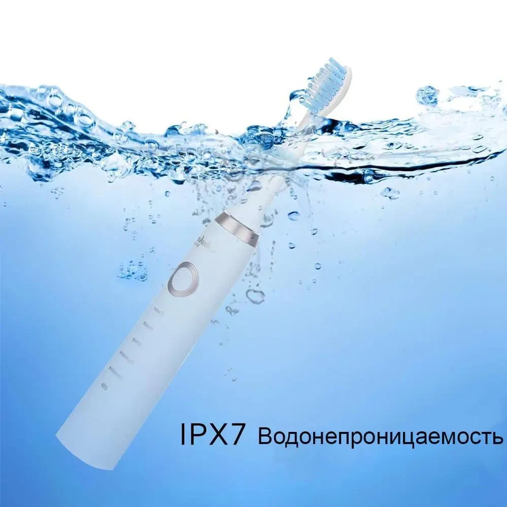 Акумуляторна зубна щітка Shuke SK-601 з 4 насадками (біла)