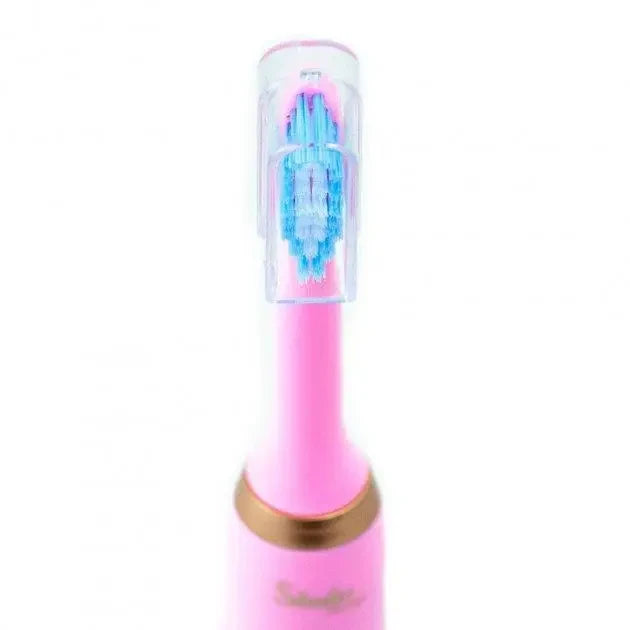 Акумуляторна зубна щітка Shuke SK-601 з 4 насадками (рожева)